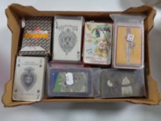 A box containing vintage playing cards.