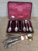 A cased set of five silver teaspoons with sugar tongs together with a further set of five silver