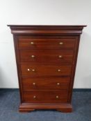 A good quality five drawer chest in mahogany finish with brass handles