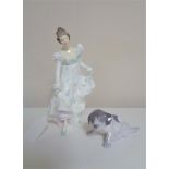 A Royal Doulton figure - Minuet HN 2019 and a Royal Copenhagen figure number 1311 of a puppy