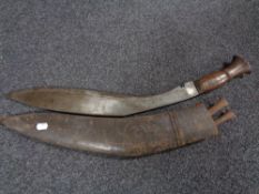 A very large Kurki knife in leather sheath