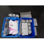 Two boxes containing printer paper, laminating rolls, pouches etc.