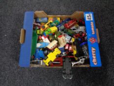 A box of play worn die cast vehicles to include Matchbox,