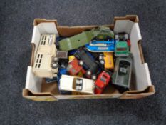 A box of a quantity of mid 20th century and later play worn die cast vehicles to include Matchbox,