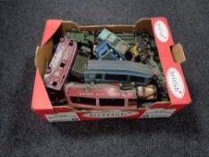 A box of a quantity of mid 20th century play worn Dinky die cast vehicles to include military