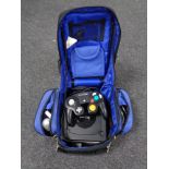 A gamer's bag containing Nintendo Gamecube with accessories
