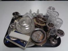 A tray containing assorted plated wares to include trays, wine coasters, vases,