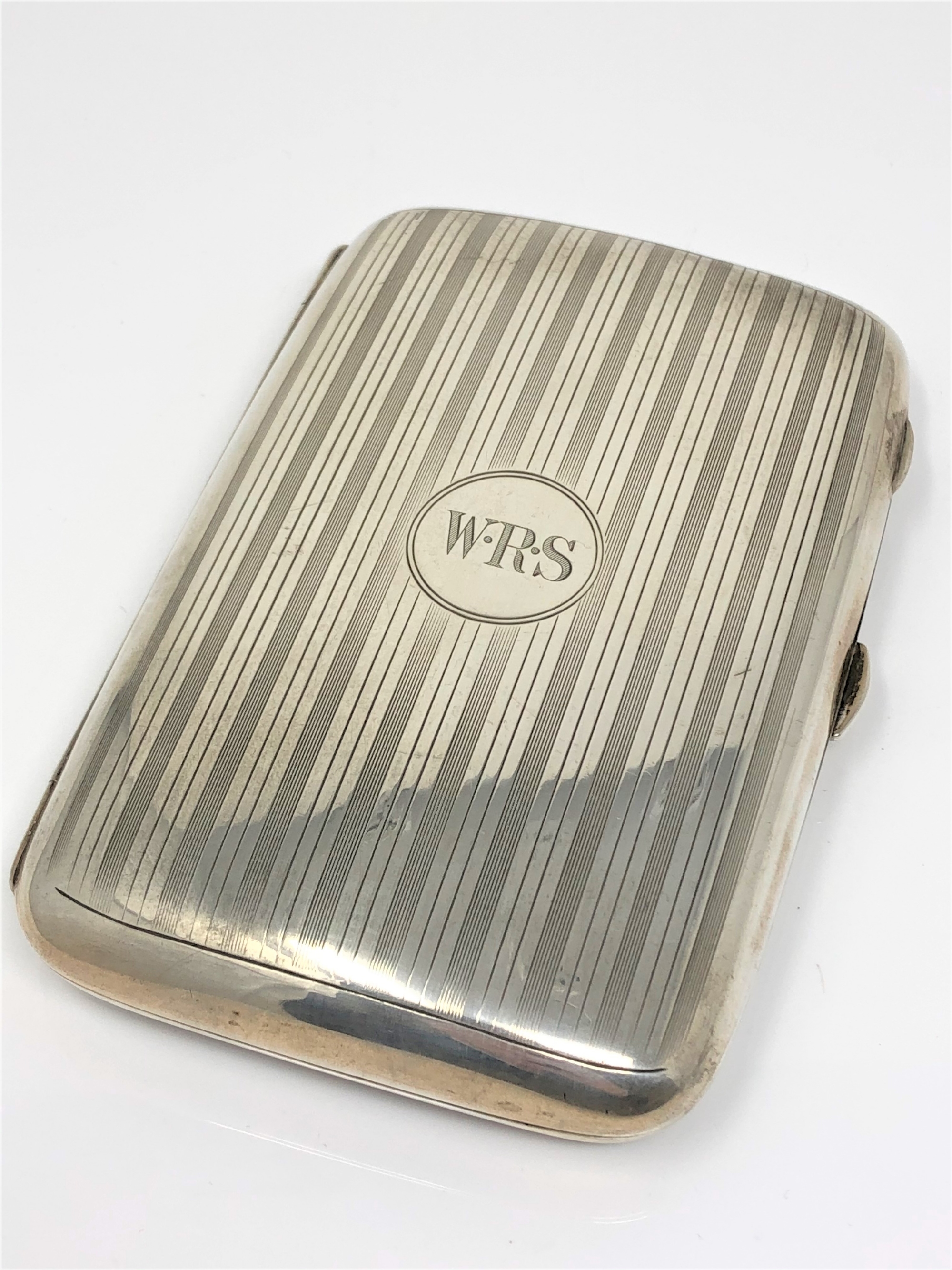 A heavy George V silver gilt cigar case with inscription 'Presented to W R Steele Esq.