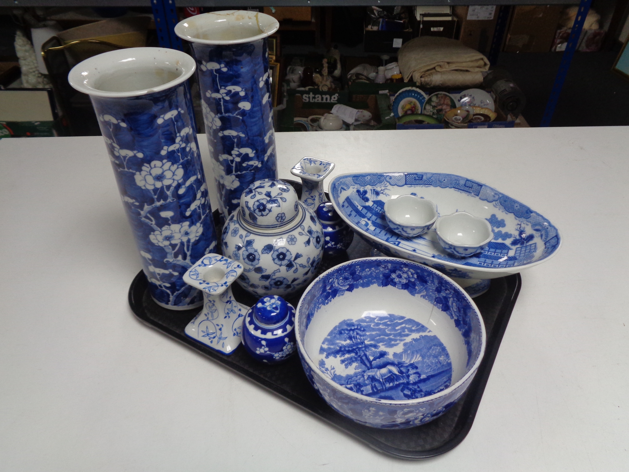 A tray containing an antique blue and white bowl together with a quantity of blue and white