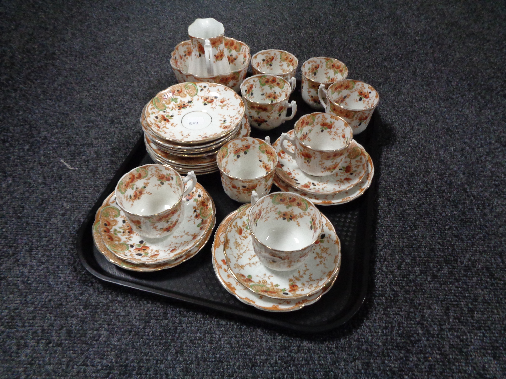 A tray of twenty six pieces of antique Duke floral pattern tea china
