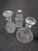 Three cut glass lead crystal decanters with stoppers