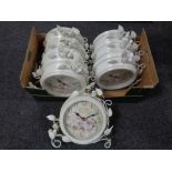 A box of eight contemporary metal French style wall clocks