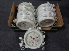 A box of eight contemporary metal French style wall clocks