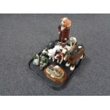 A tray of assorted figurines to include Japanese dogs, Beswick shire horse,