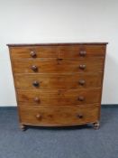 A Victorian mahogany bow fronted six drawer chest.