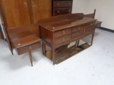 A Stag Minstrel six drawer dressing chest with triple mirror and headboard