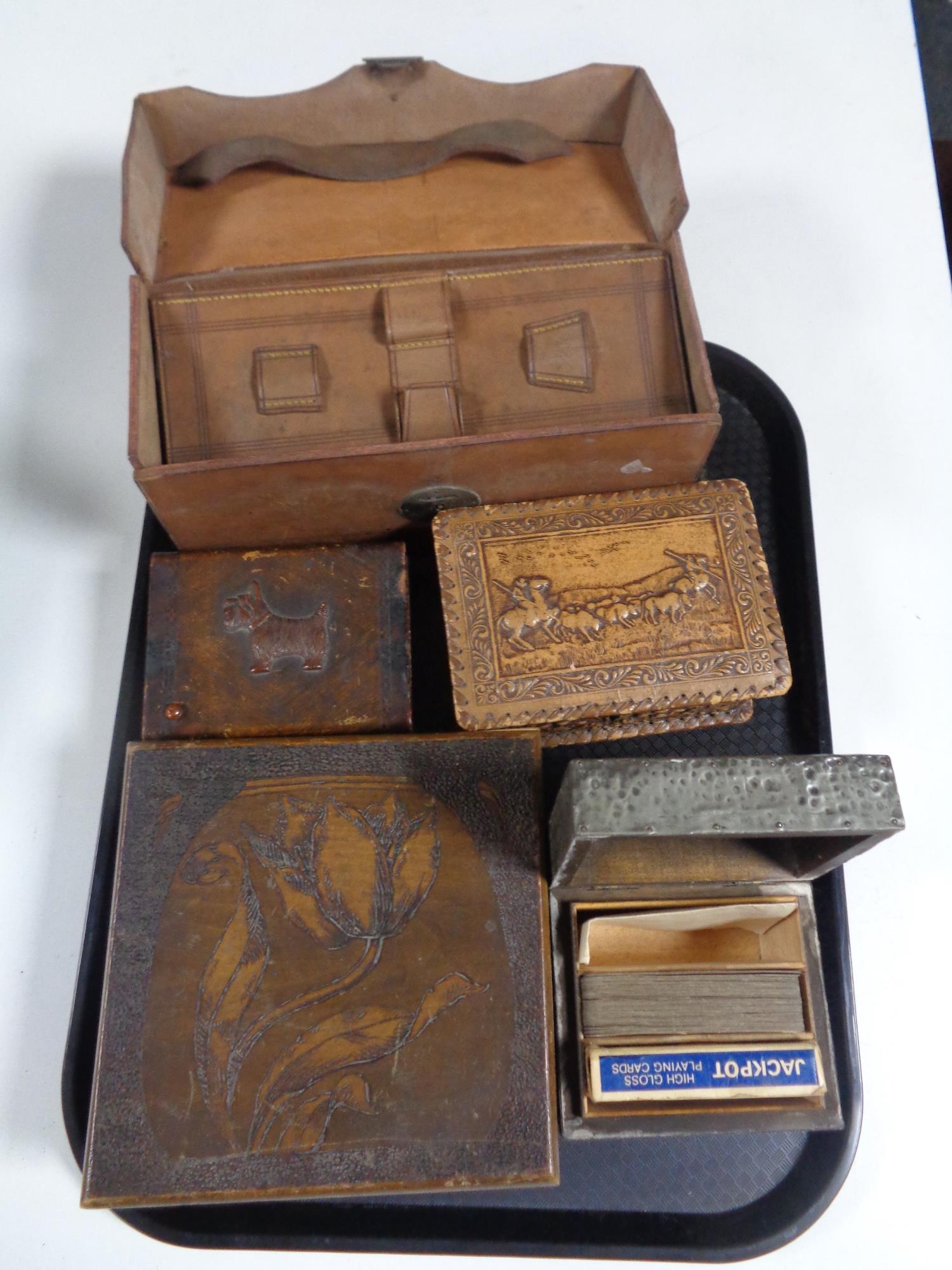 A tray of Edwardian leather cased gent's travel set, trinket box to include poker work example,
