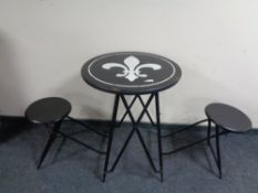 A folding bistro table / stool set bearing cub scout emblem