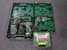 A box containing cased Bosch 18 volt drill,