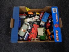 A box of assorted play worn die cast vehicles to include Majorette, Maisto,