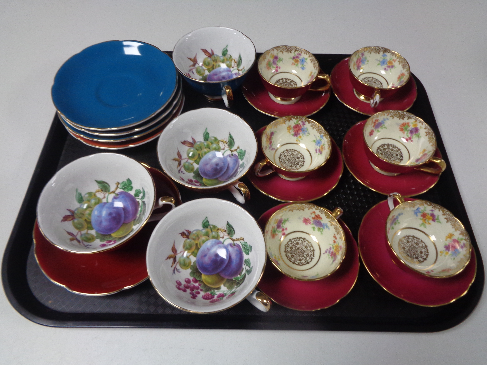 A tray containing six Paragon bone china cups and saucers,