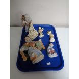 A tray containing six oriental figures.