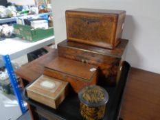 A tray containing 19th century and later boxes to include jewellery box, tea caddy,