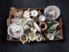 Two boxes containing miscellaneous china to include figurines, tea ware, character jug,