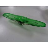 A 1970's green glass bowl,