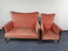 A late nineteenth century mahogany framed high backed two seater settee and armchair in striped