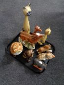 A tray of nine twentieth century Dutch and Russian animal figures