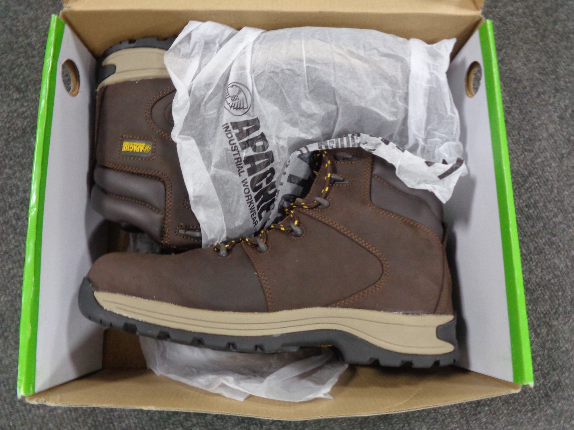 A pair of Apache steel toe-capped work boots,