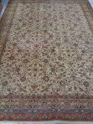 A floral Axminster carpet with borders on cream ground,