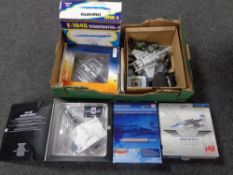 A box containing boxed and unboxed die cast aircraft to include F104 Star fighters,