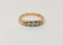 An 18ct gold five stone diamond ring, size I CONDITION REPORT: 3.