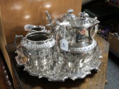 A four piece Walker and Hall Sheffield plate tea service on tray.