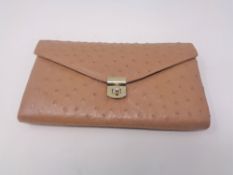 A vintage ostrich leather purse by Corbeau