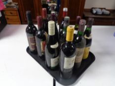 A tray containing twelve bottles of assorted wines.