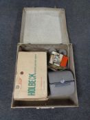 A case containing boxed Holbeck movie projector, a VU- editor splicer etc.