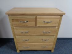 A contemporary pine five drawer chest, 90 x 40 x 95 cm.