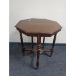 An Edwardian mahogany octagonal occasional table.