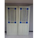 Two painted interior doors with coloured glass and etched glass panels, 198 x 76 cm.