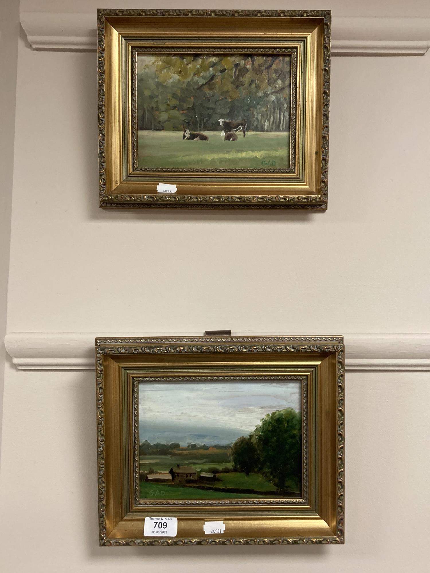 Two oil on panels depicting farmland, initialled GAD, framed.