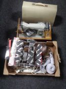 A cased Jones electric sewing machine together with a box containing kitchen electricals,
