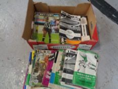 A box of 1970's and later Newcastle United home and away football programmes