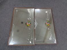 A pair of Edwardian framed etched glass mirrors.