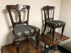 A pair of Edwardian stained beech dining chairs