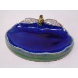A Royal Doulton Potteries glazed soap dish made by proprietors of Wright's Cold Tar Soap depicting