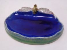 A Royal Doulton Potteries glazed soap dish made by proprietors of Wright's Cold Tar Soap depicting