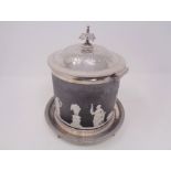 A Wedgwood Jasperware basalt biscuit barrel with plated lid and stand